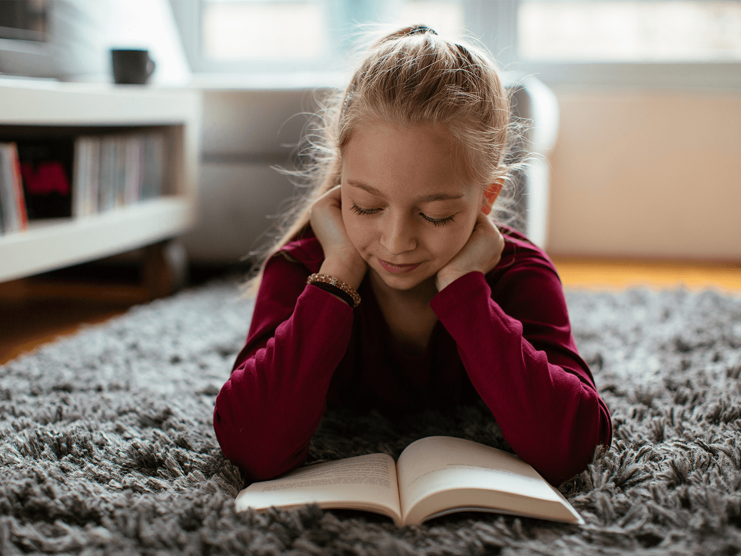 Kid reading a book